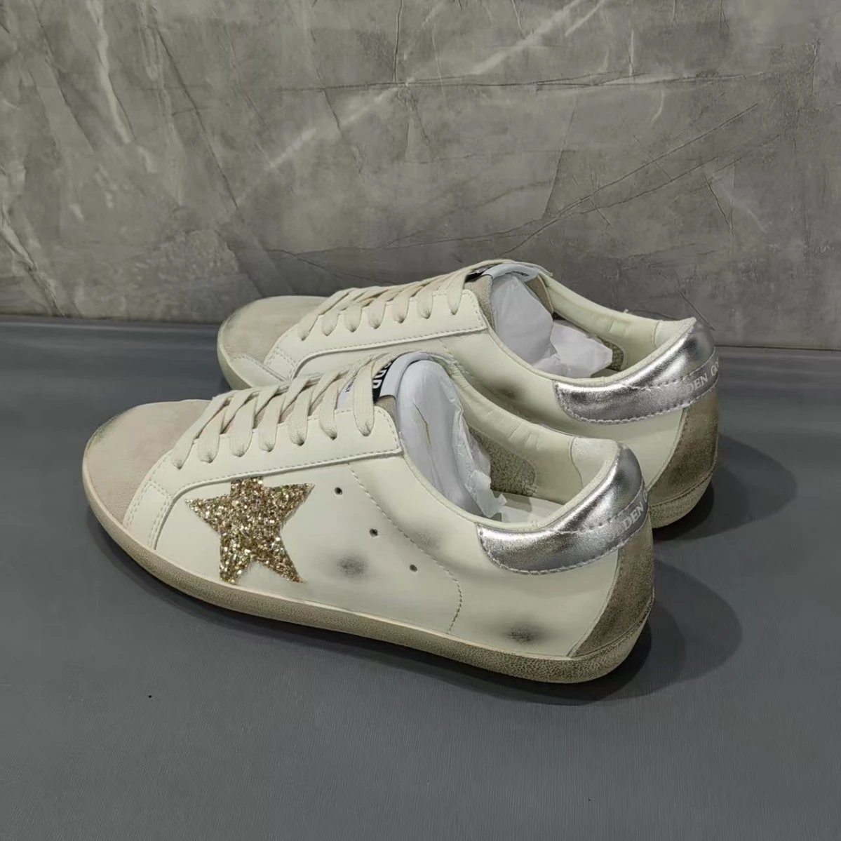 Golden Goose Super-Star Distressed Sneakers White and Gold — product photo 1