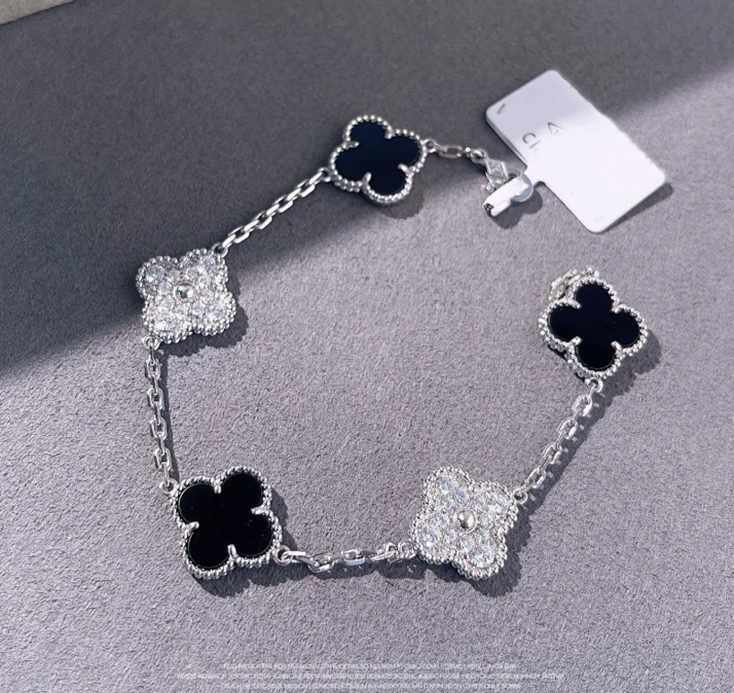 Van Cleef & Arpels VCA Vintage Alhambra Clover Bracelet Onyx and Diamond Silver — product photo 1
